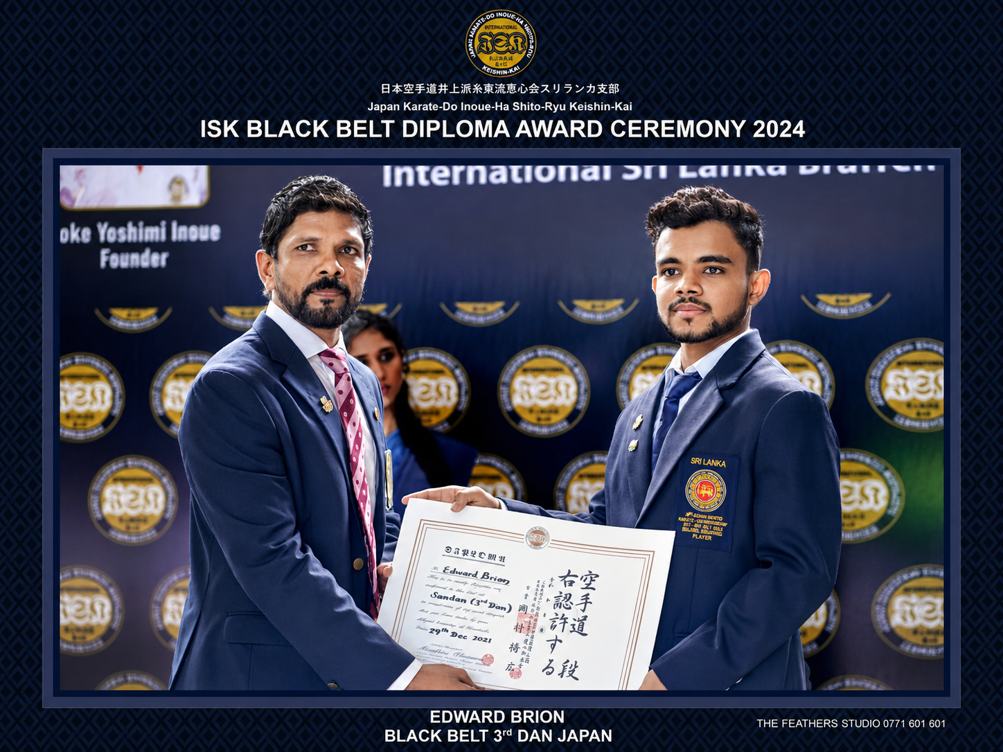 Edward Brion receiving his third dan black belt diploma