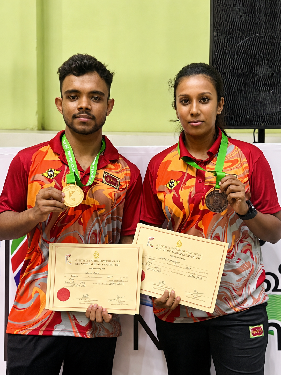 Sri Lankan karate medallists holding gold and bronze medals and certificates from the 49th National Sports Games 2024